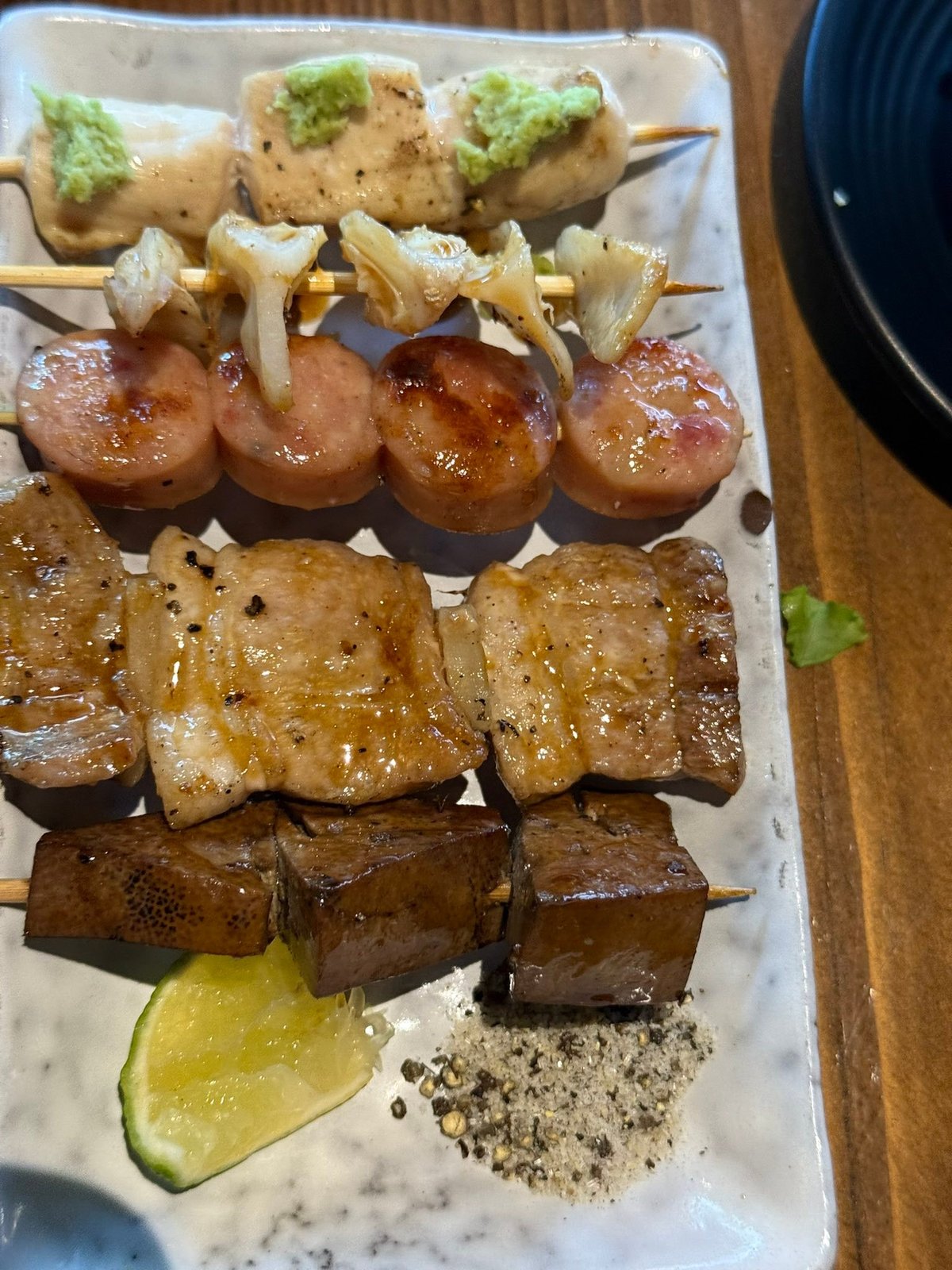 Yakitori: sausage, pork belly, liver, and more.