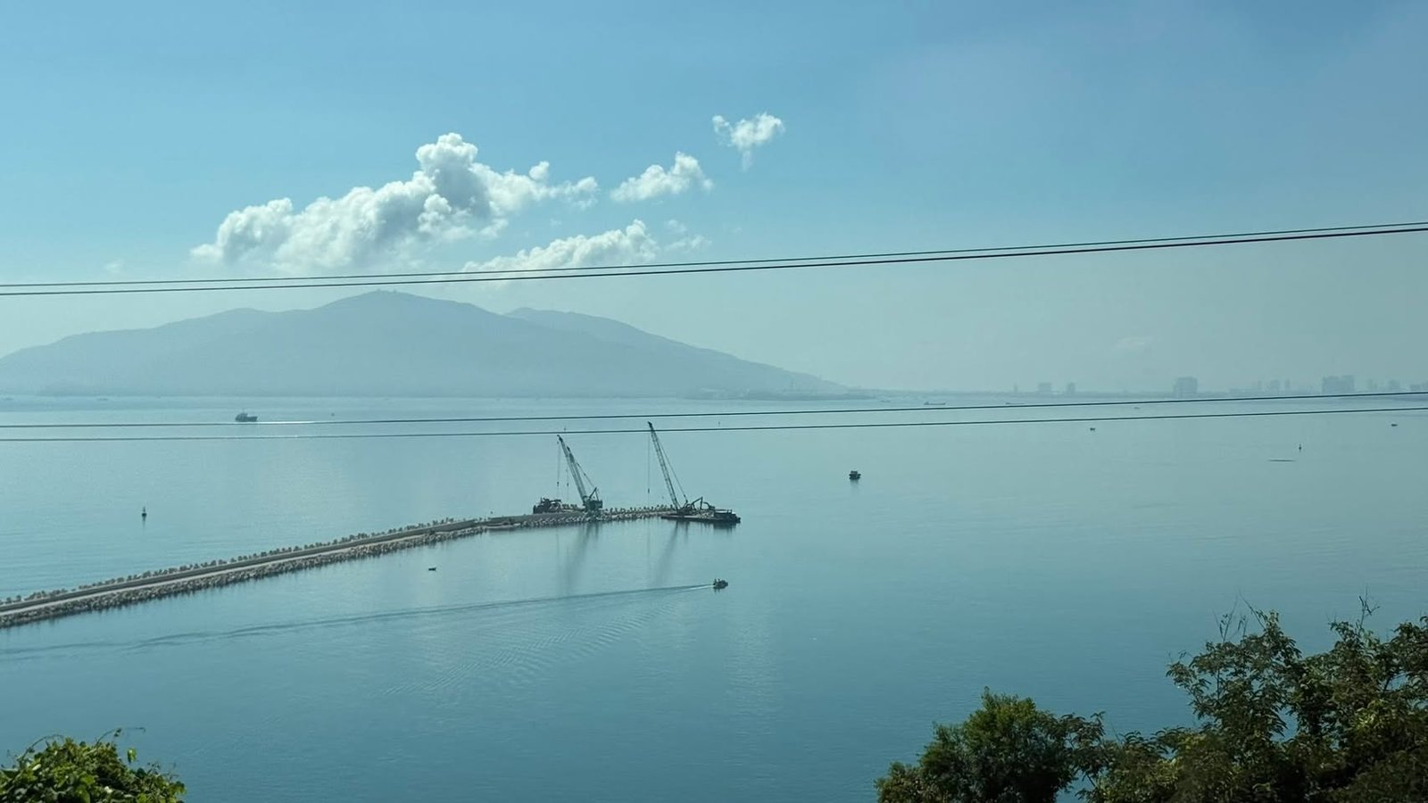 A new breakwater reaching into Da Nang Bay.