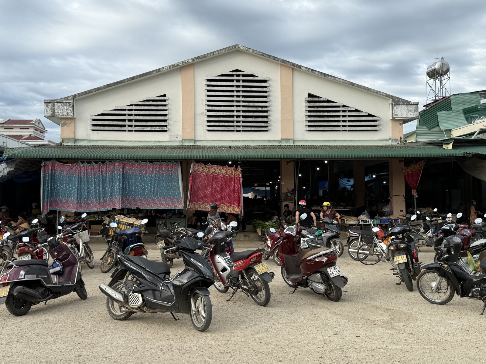 The market hall, and the morning's motorbike parking.