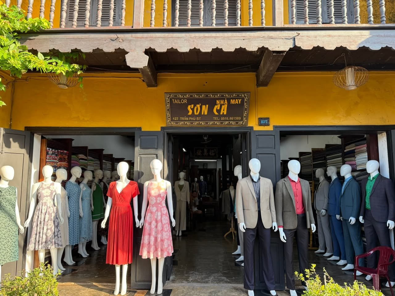 Suits on one side, sundresses on the other.