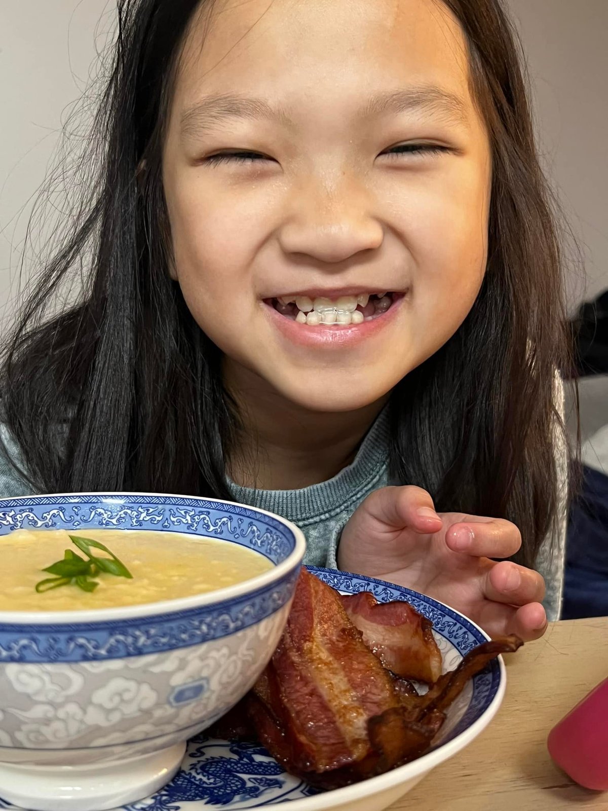 Saturday breakfast for two: Jennie and a bowl of broken rice cháo.