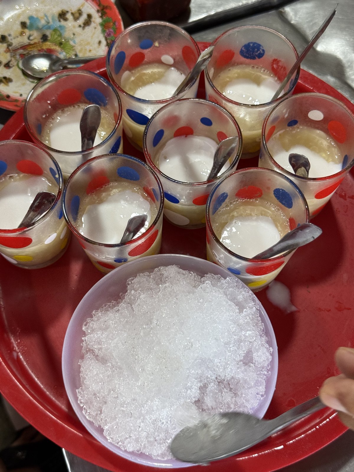 Chè bắp, with a bowl of ice on the side.