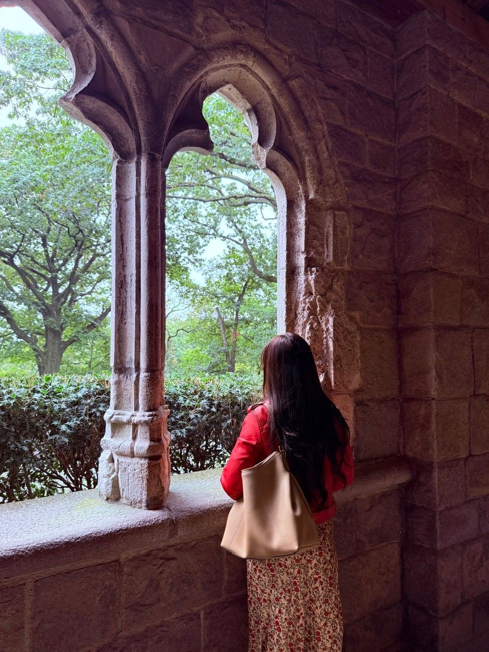 Diem at the arches of the Cloisters.