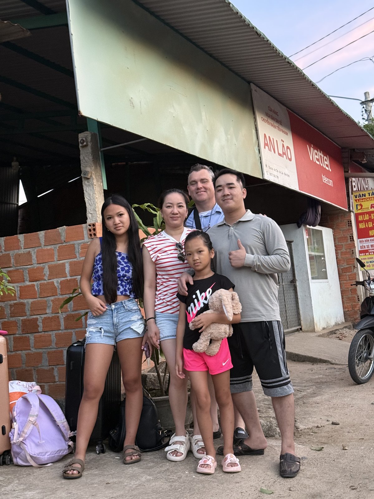 At the van stop in An Lão, a little after five.