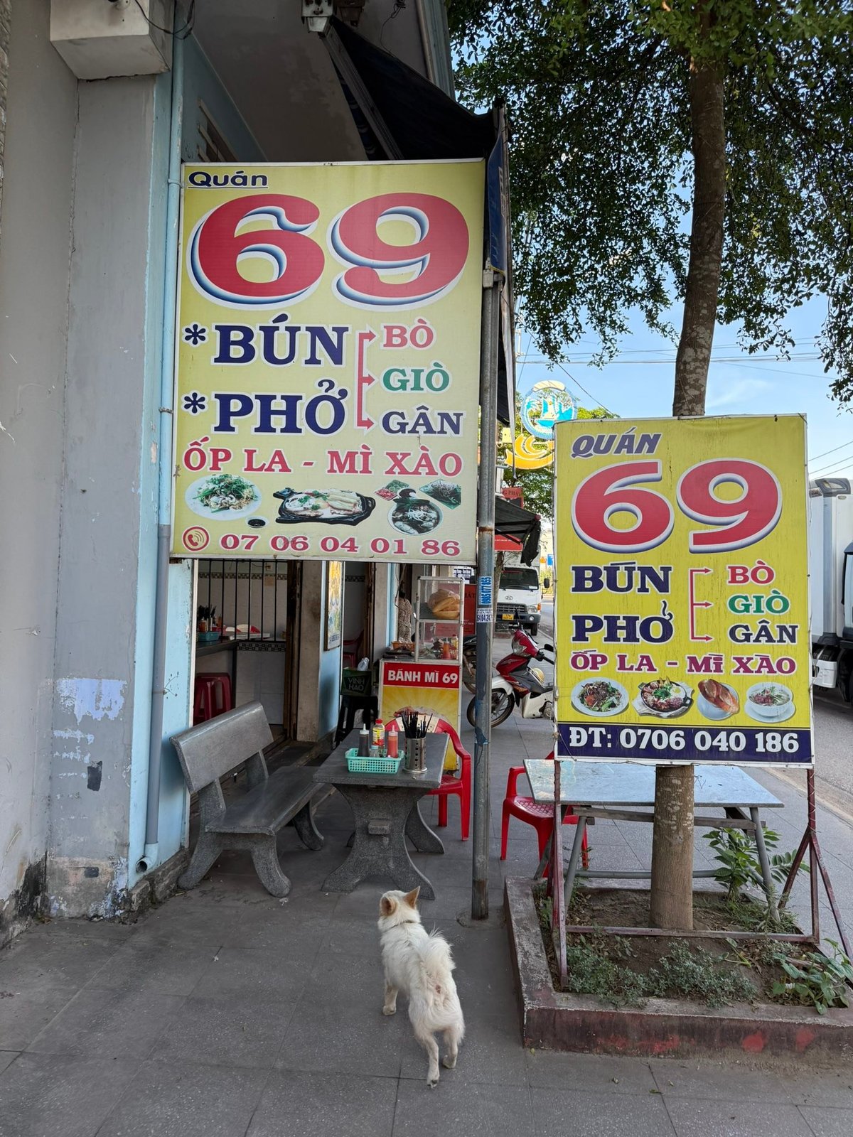 The signs out front, and the doorman.